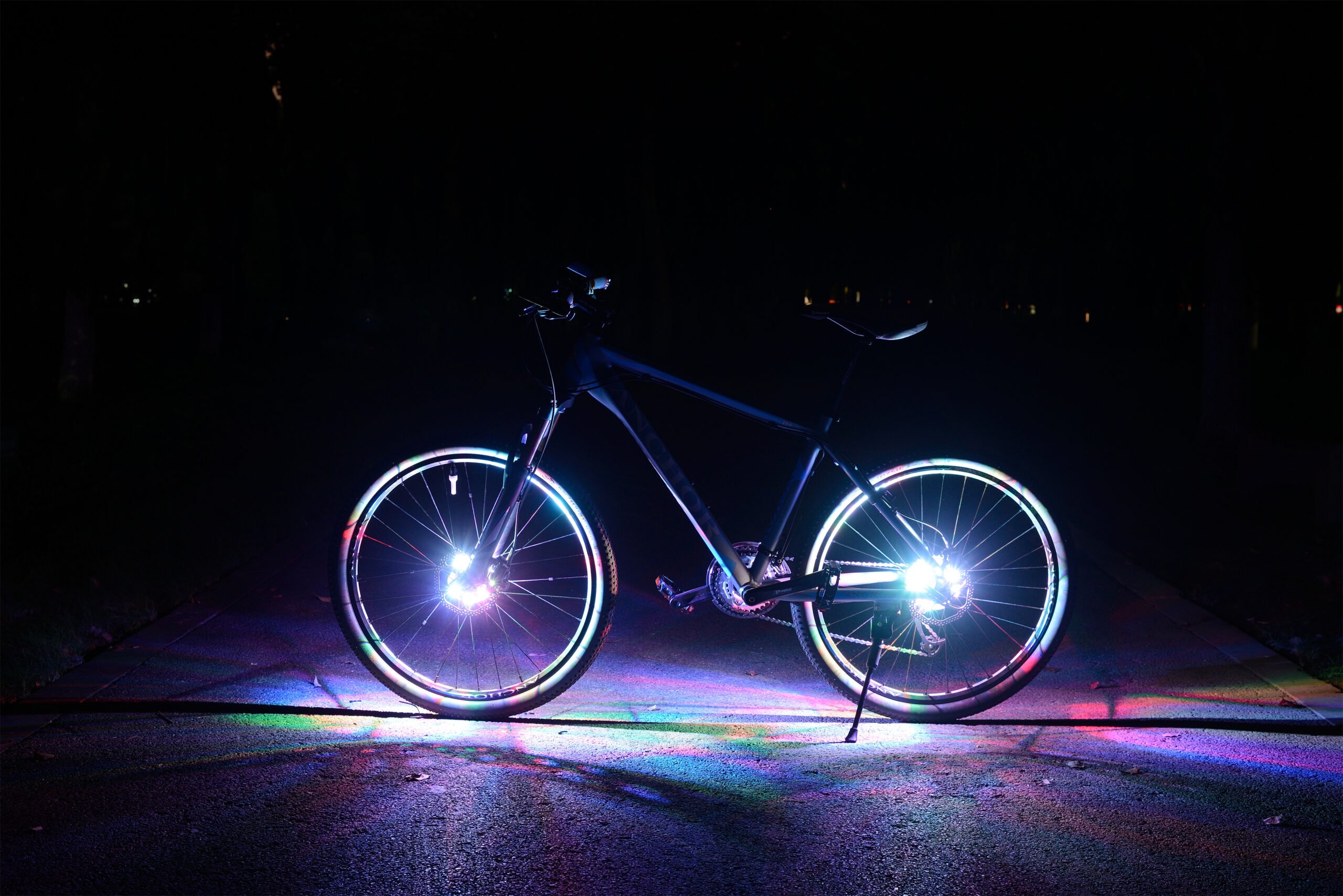 Colorful LED wheel lights for eBike night rides at Burning Man – Playa eBikes