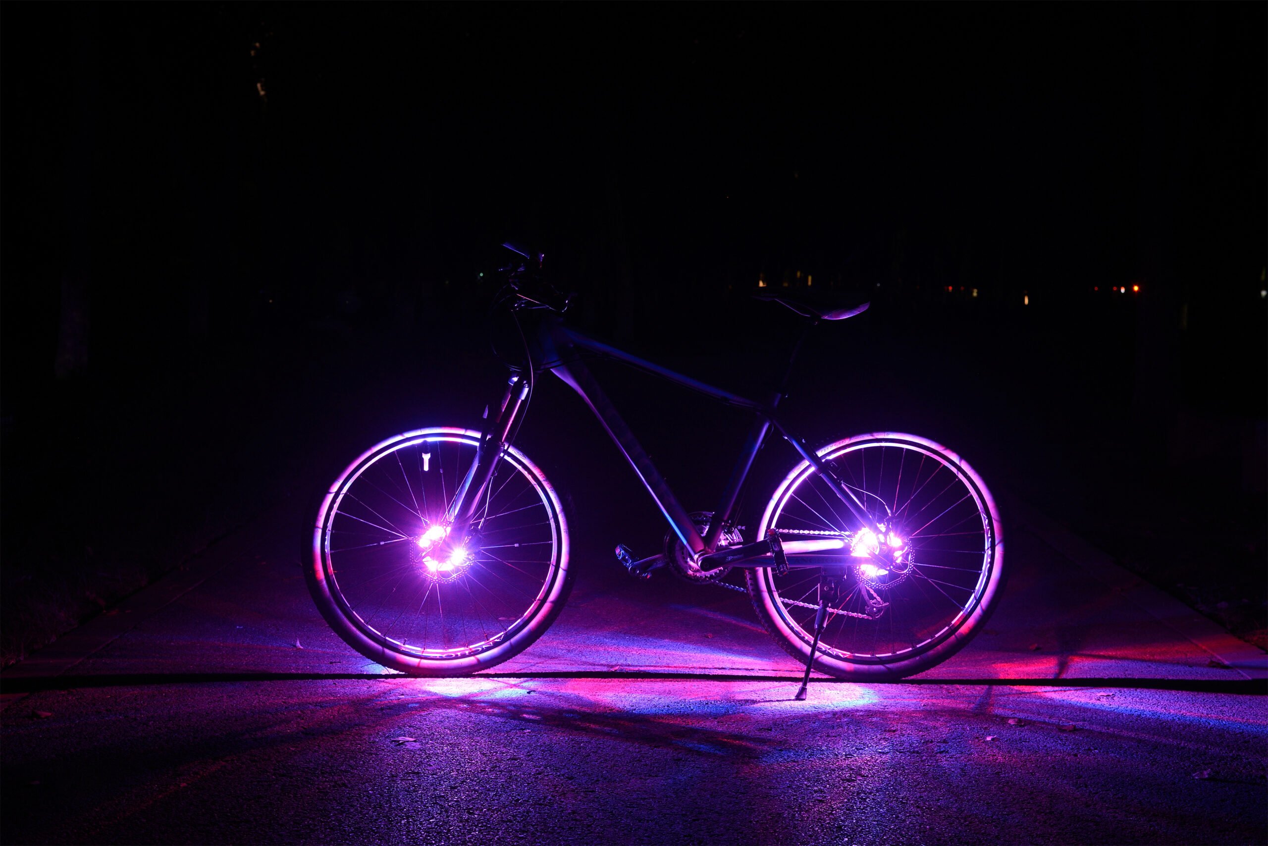 Colorful LED wheel lights for eBike night rides at Burning Man – Playa eBikes